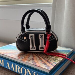 #11 WAG bag! Paris Hilton Stylish Black and Red Women's Bag